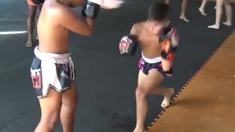 Sparring of young Muay Thai