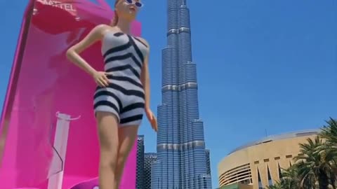 Watch this giant 'Barbie' near Burj Khalifa in Dubai Using project blue beam simulation