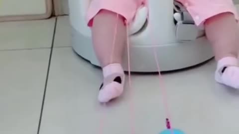 Cute kid playing with toys