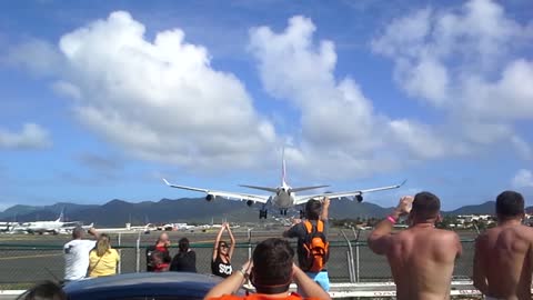 The View of an Airbus A-340 from Maho Beach