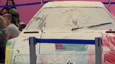 Climate activists throw flour at Andy Warhol car inItaly