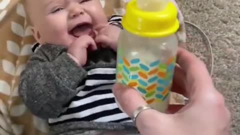 Cute chubby baby lauging