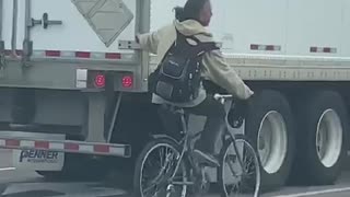 A Toronto Man On A Bike Was Caught Hanging Onto The Back Of A Truck While Cruising Down The Road