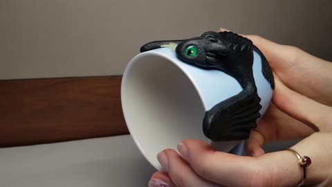 Night Fury Toothless FISH Bite How to Train Your Dragon sit on a blue cup. Gift Mug with a dragon.