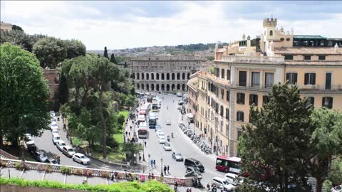 central part of rome italy traffic and pedestrian along the street