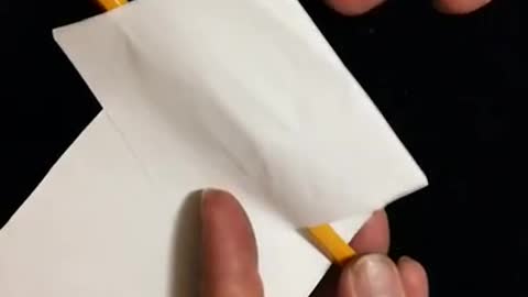 Pencil melts thru bill without damage to paper? How?