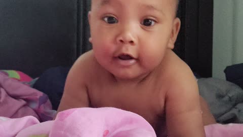Adorable 6-month old biracial baby learns to 👋