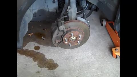 How to Replace Front Brake Pads and Rotors on a 2004 Mazda 6