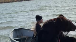 Woman Has a Fishing Trip with Archie the Brown Bear