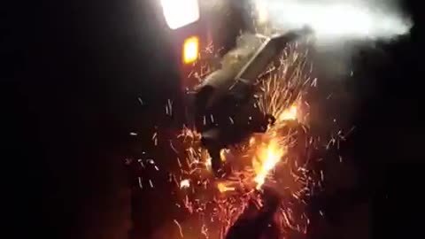 Running jeep car over bonfire