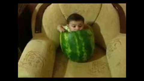 little baby in big watermelon