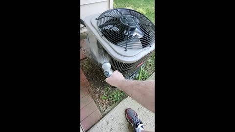 Cleaning off Air Conditioning unit