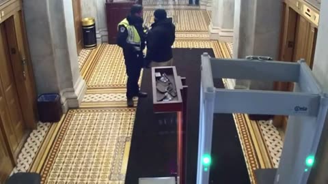 Footage Shows Capitol Officers Uncuffing January 6 Protester, Giving Fist Bump Before Releasing Him