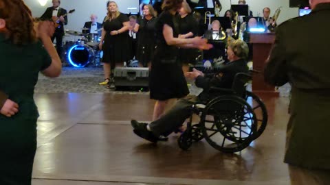 WWII Veteran Charlie Reinhardt on the Dance floor at the Crew 1944 Truce Ball