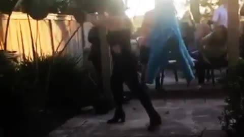 Lady blind folded misses blue pinata