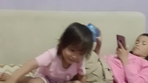 Aira happy to play baloon