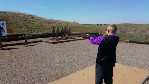 Little boy Instantly regrets trying to shoot a shot gun!