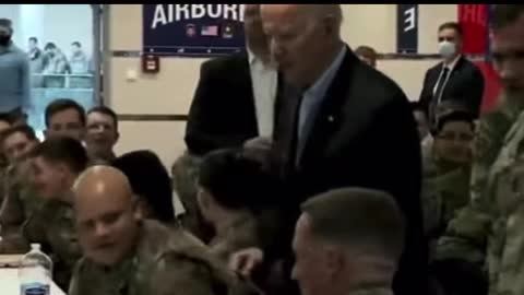 Biden shares some pizza with US troops