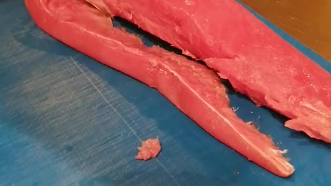 Slicing tuna fish