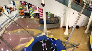 Japanese children having fun inside a mall