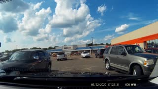 Truck Leaving Parking Lot Hosts Heated Altercation