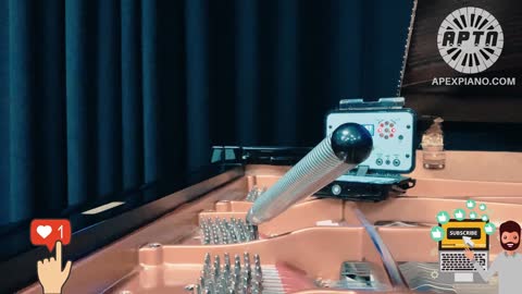 Watch a piano tuner tune unisons on a grand piano