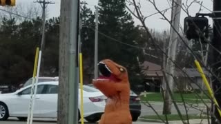 Happy T-Rex Dances at Intersection