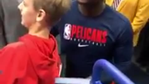 Morant makes young fan's day by gifting his shoes after.