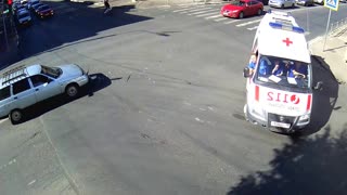 Motorcyclist Struck by Car in Russia