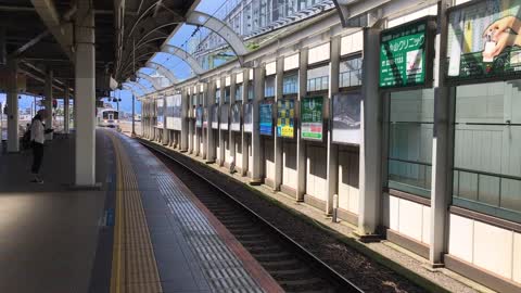 A Train Passing by the Railway Station