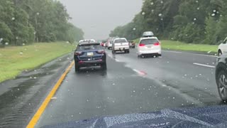 Summer hail storm causes car crash