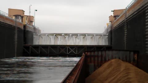 Illinois River Locks lifting a barge & Tug