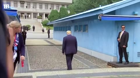 Moment Trump steps into North Korea to meet Kim Jong-un