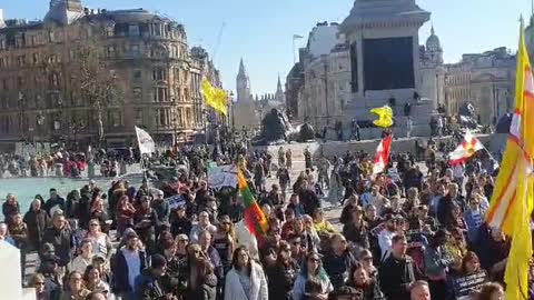 Protesters gather in Trafalgar Square in London UK for the world wide freedom rally