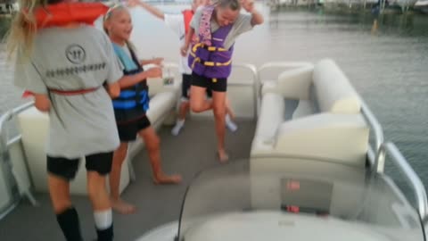 Soccer Girls jamming on the boat after practice