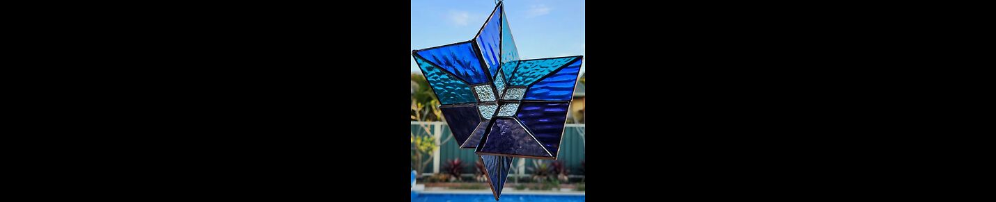 stained glass wind catchers -My pride in her creations